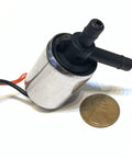 12V Pneumatic Solenoid Valve Normally Closed 4 PSI Three Sixteenths Inch Port Metal Body with penny for size comparison