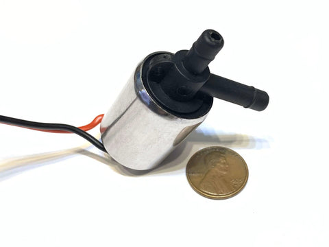 12V Pneumatic Solenoid Valve Normally Closed 4 PSI Three Sixteenths Inch Port Metal Body with penny for size comparison
