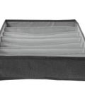 Multi Compartment Foldable Linen Drawer Organizer Box For Bras And Socks in grey fabric with multiple sections for storage.