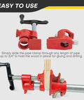 Built Tough Heavy Duty 3/4 Inch Pipe Clamps For Woodworking, Tough As Nails Cast Iron Gluing Bars with Quick Twist Knobs in use.