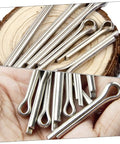 220 Piece Dowel And Cotter Pin Assortment Kit For Automotive Repair With Hairpin And Hitch Pins Versatile Fasteners For Mechanics Garage Use Easy Install And Secure Fit, stainless steel pins in hand