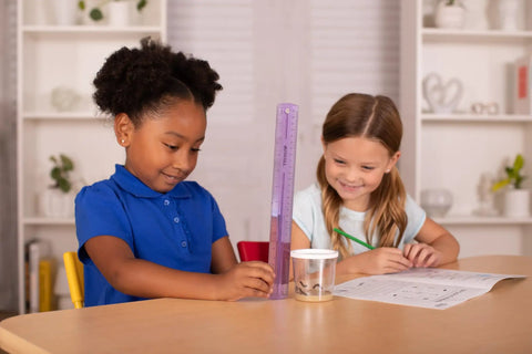 Children using Butterfly Garden Kit With 10 Live Caterpillars, Habitat, Feeder, Chrys-A-Lid Holders, And STEM Activity Journal