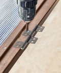 Installation of heavy duty stainless steel door hinges 2 pack with 360 degree damping pivot on a door frame.