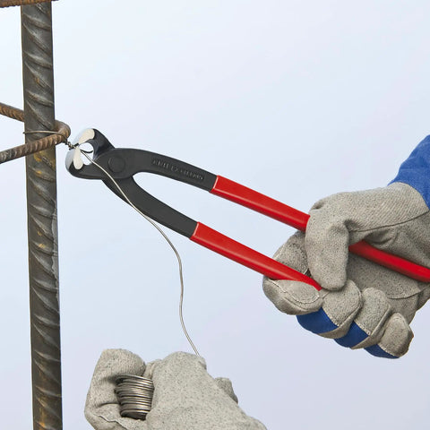 Concreters Nippers With Cushion Grip For Quick Wire Cutting And Twisting Induction Hardened Edges in use on rebar