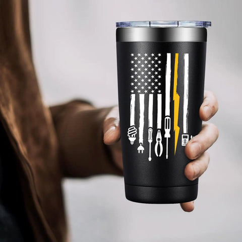 Person holding 20oz Electrician Tumbler Gift For Men Hilarious On Site Gear No Brainer Gift with American flag and tool design.