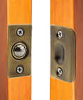 2 Pack Closet Door Ball Catch Hardware Stainless Steel French Door Ball Latches Adjustable Cabinet Latch With Strike Plate Drive In Spring For Closet And Cupboard Doors Antique Gold installed on wooden doors