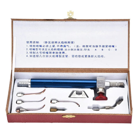 Portable Oxygen Torch Kit with Interchangeable Nozzles in open box, showing torch handle and nozzles for construction and repair.