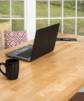 Slick Electric Standing Desk With Genuine Solid Wood Top And Easy Programmable Memory Controls Dual Motor Lift Mechanism For A Hustle Ready Sixty Inch Workstation Setup showcasing a black laptop and coffee mug.