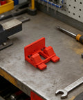 Heavy Duty Electric Wire Welding Fixture Strength Clamp For Secure Connection In Damp Garages No Rust, Super Quick Install Fixation Wire Holder on a workshop table.