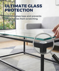 Rock Solid Clear Silicone Anti Slip Pads For Glass Tables And Desks With Zero Slide Grip and Protective Two Millimeter Cushion placed under glass table.