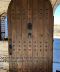 Wooden door with Premium One And A Half Inch Clavos Nails With Matte Black Powder Coat Finish built to last, outdoor use.