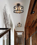 Farmhouse 3 Light Semi Flush Mount Ceiling Light Fixture in Matte Black and Gold Finish with Openwork Circle Frame in hallway