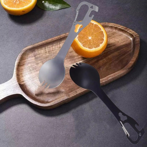 5 In 1 Stainless Steel Spork Fork Spoon Combo With Can Bottle Opener for outdoor picnics on a wooden board with orange slices