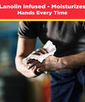 Person using Oversized 10X12 Cleaning Wipes For All Purpose Garage And Auto Cleanup Ink Paint Tar Grime Remover, lanolin infused