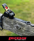 No Nonsense Retractable Ratcheting Tie Down Straps 2 Pack Black 1 In X 6 Ft With Vinyl Coated Hooks on a wooden fence.