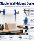 Heavy Duty Wall Mount Bubble Wrap Dispenser Built Tough Industrial Steel Roll Holder with bubble wrap in use.