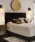 2 Pack Black And Gold Wall Sconces With Clear Glass Shades Sleek Modern Farmhouse Vanity Lights beside bed in bedroom