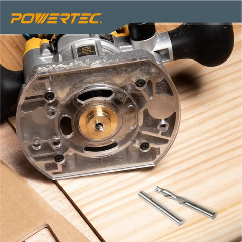 Knockout Router Inlay Kit Featuring Solid Brass Bushing Guide And Precision Centering Pin With Tungsten Carbide 1/4 Inch Upcut Downcut Spiral Bits for smooth template tracking, tools on wooden surface.