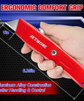 In-hand front view of red JETMORE retractable box cutter; aluminum alloy body, blade extended.