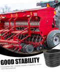 Garden Seeder Roller Replacement For Planters And Ground Spreader Wheel With Rubber Pressure Tire Easy Install Fits Tiller Lawn Spreader And Seeding Equipment Practical Farm Gear Part For Stable Soil Seed Deployment, shown as part of red seeding equipment in farm field.