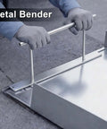 Using a 24 Inch Sheet Metal Folding Hemming Tool Bar Handle to bend and form steel panels, showing the tool in action on metal material.