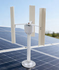 Three Blade Vertical Axis Wind Turbine Kit With 12V 40W 3-Phase Permanent Magnet Motor mounted on a solar panel