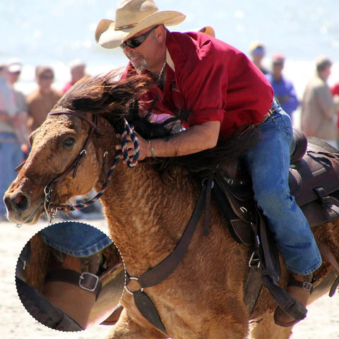 Cowboy riding a horse with 2 Piece Leather Spur Straps For Boots, Adjustable Western design, in rustic brown leather.