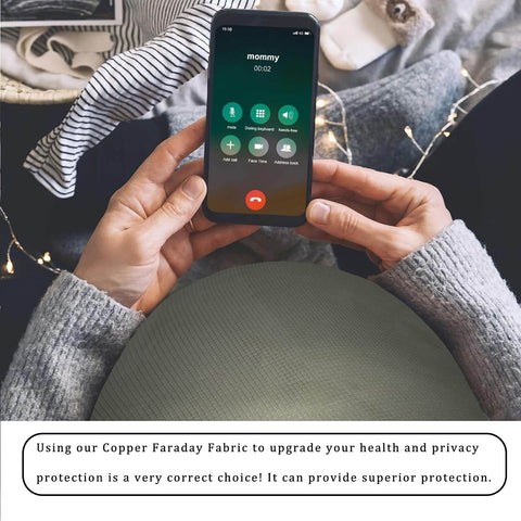 Person using phone covered with Faraday Shield Fabric For EMF Protection That Blocks WiFi RF GPS And RFID Signals With Copper Nickel Polyester Blend.