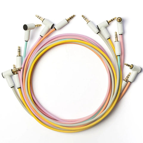 MickXer 5 Way Passive Mixer With Candycord Color Cables Six Pack And Noise Filtering Kit featuring 3.5mm mini jack cords in pastel colors.