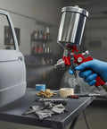 Heavy Duty HVLP Paint Spray Gun Kit Features Gravity Feed And Tweakable Air Valve With Five Precision Nozzles Plus A Tough Aluminum Cup in use.