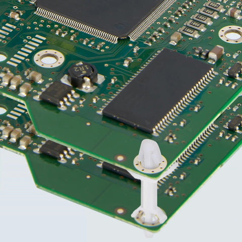 Top Shelf 60 Pack Nylon PCB Standoffs With Snap Tight Reverse Locking Clamps 12.9 mm Height secured on circuit board.