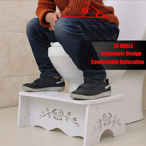 Person using Ergonomic Squatting Toilet Stool For Adults, Sturdy Detachable Wood Plastic Composite Step Stool for better posture.