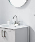 4 Inch Centerset RV Bathroom Faucet In Brushed Nickel Modern Camper Vanity Sink Tap Two-Handle Stainless Steel Lavatory Faucet For 3-Hole Setup No Fuss Install Durable Lead Free Construction on white vanity with round mirror