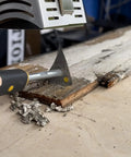 Using the Essential 3 Piece Beast Mode Heavy Duty Swedish Paint Scraper Set Bundle on wood paneling for paint removal.