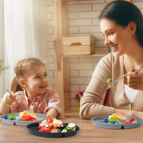 Durable 9 Inch Divided Plates Set For Kids And Adults Unbreakable Plastic Portion Control Plates on table with smiling family