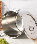 Stack It High With Heavy Duty 304 Stainless Steel Airtight Canisters 3 Pack Featuring Slam Lock Clamps For Bulk Flour Rice Grains Coffee Beans And Pet Food Storage Keeps Your Pantry Fresh With Zero Sweat Total Kitchen Flex 12L 21L And 33L, open stainless steel canister with lid.