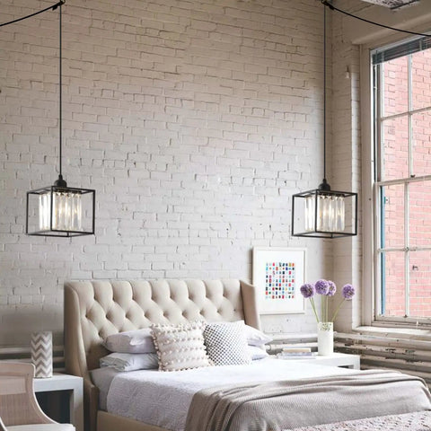 Plug In Pendant Light With Cord In Black Metal Cage And Crystal Accents in modern bedroom setting