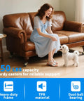 Hella Sturdy 2 Inch Ball Casters Paired With Soft TPR Wheels And Heavy Gauge Brass Plates For No Sweat Furniture Sliding Ideal For Quick Room Makeovers Or Shop Fixes Set Of Four near a woman on a brown sofa with dog.