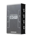 Junction Box for Guitar and Bass Pedals, TRS Stereo Four-Channel Organizer, compact metal design with side input jacks.