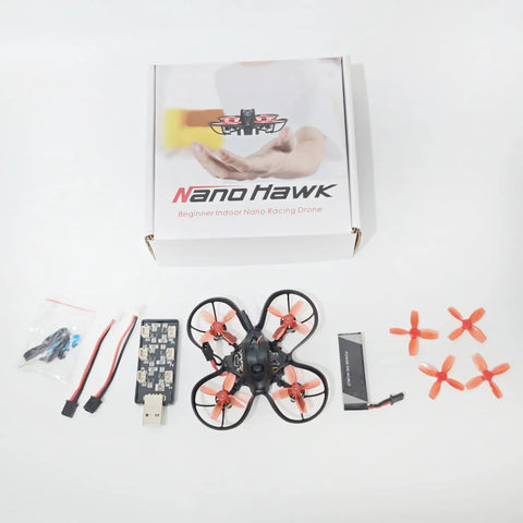Nano Hawk FPV 65mm Tiny Indoor Outdoor Micro Whoop Drone with ultra light frame and accessories laid out on a table.