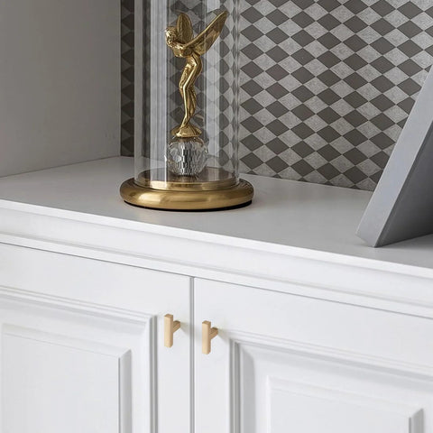 Set Of 30 Solid Single Hole Slim Square Bar Cabinet Pulls In Champagne Bronze Finish for kitchen cabinets, shown installed on white cabinet.