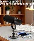 Real Deal Desktop Microphone Stand Crafted For Shure Mv7 Series Models with low-profile design on a desk next to a keyboard.
