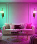 BOKT Battery Operated Light Wall Sconce 2 Pack Wireless Vintage Wall Light illuminating a stylish living room with colorful lights.