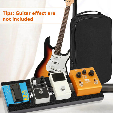 Ultra Portable Mini Guitar Pedal Board Kit With Aluminum Alloy Black Finish 15 By 5.7 By 1.18 Inches Includes Four Six Inch Patch Cables Carrying Bag Adhesive Hook Side Tape And Cable Ties For Easy Gig Setup displaying pedals and guitar backdrop