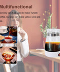 Glass Turkish Coffee Maker Portable 600ml Electric Turkish Pot with glass body and SUS base on a table, brewing coffee.