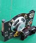 AM FM Radio Kit For Learning And Practice A Hands On Soldering Project That Teaches Electronics with exposed circuit board and speaker