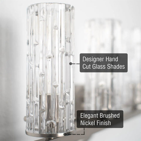 Close-up of Ophelia 22 Inch Modern Four Light Vanity Fixture with cylinder hand cut glass shades in brushed nickel finish
