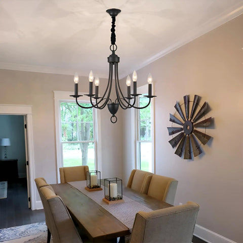 Six Light Black Farmhouse Chandelier With Industrial Modern Vibe Candle Style Hanging Light Fixture in dining room setting