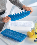 Person holding blue ice tray over Ice Cube Bin That Holds Four Trays, Compact White Plastic Organizer For Busy Kitchens, Keeps Ice On Tap And Ready To Use, Durable And Easy To Use Storage Solution