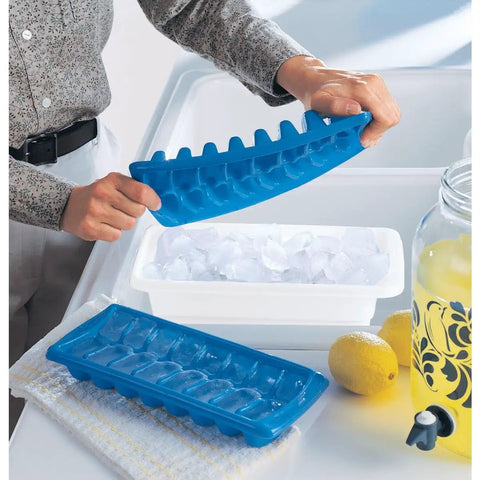 Person holding blue ice tray over Ice Cube Bin That Holds Four Trays, Compact White Plastic Organizer For Busy Kitchens, Keeps Ice On Tap And Ready To Use, Durable And Easy To Use Storage Solution
